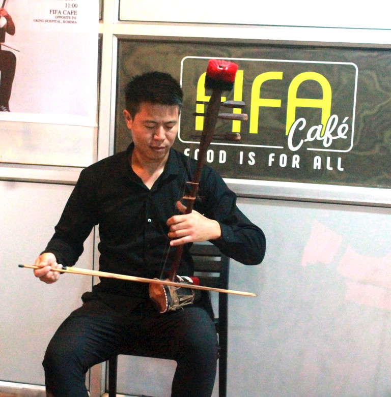 Atso Chasie playing the Gei-ü, a creative 3 stringed indigenous folk instrument. (Morung Photo)